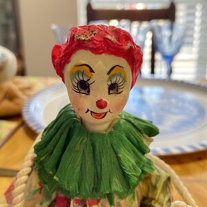 A spectacular Paper Mache Hand Made Clown from 1960s. Hand painted face on Swing
